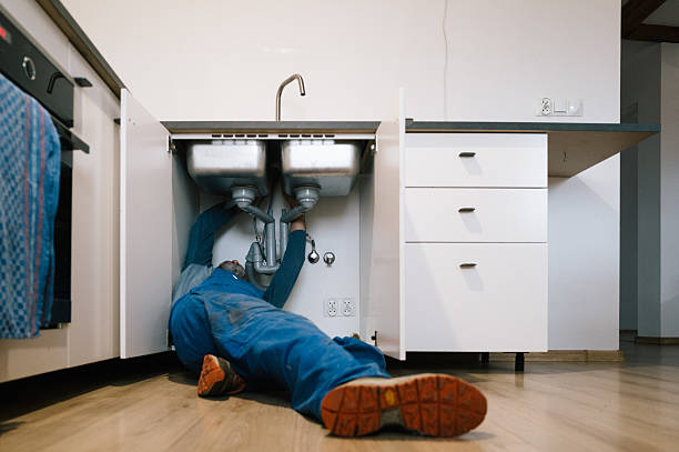 Professional Emergency Plumber technician working in Sibley, IA